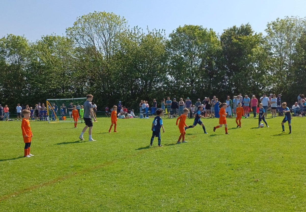 The Suffolk FA Grassroots Festival | Action from the Mixed U8s Festival between @StJohnsIpswich Lions (orange shirts) and <a href="/WickhamMarketFC/">Wickham Market FC</a> Navy (blue shirts)

#SFAGRF24
#AThrivingLocalGame