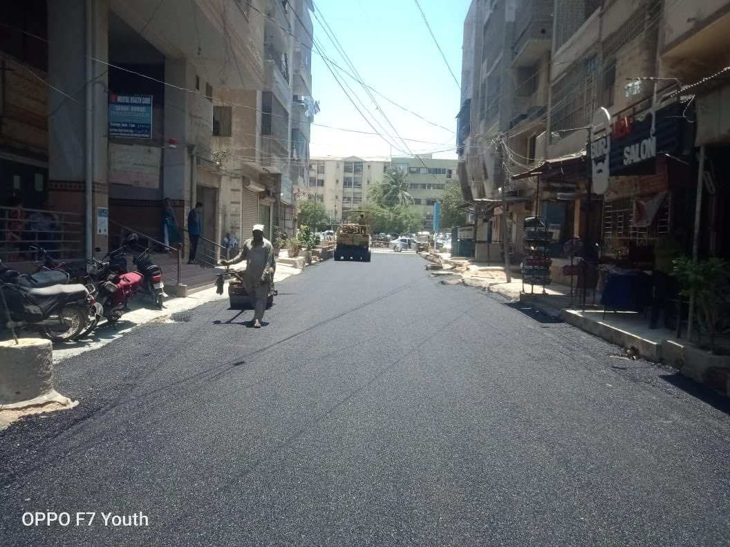 Road rehabilitation work is being carried out by KMC in Block 4 of Gulshan e Iqbal #KarachiWorks