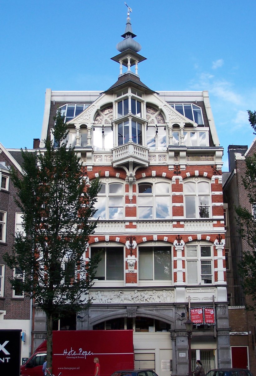 A milk factory in #Amsterdam (Noord-Holland), constructed in a mix of Neo-Renaissance and Chalet style by Ed. Cuypers around 1890, commissioned by the 'Amsterdamsche Melkinrichting' (AMI). The sculpted frieze, depicting children in a milk bacchanal, is by the Fleming Emille van