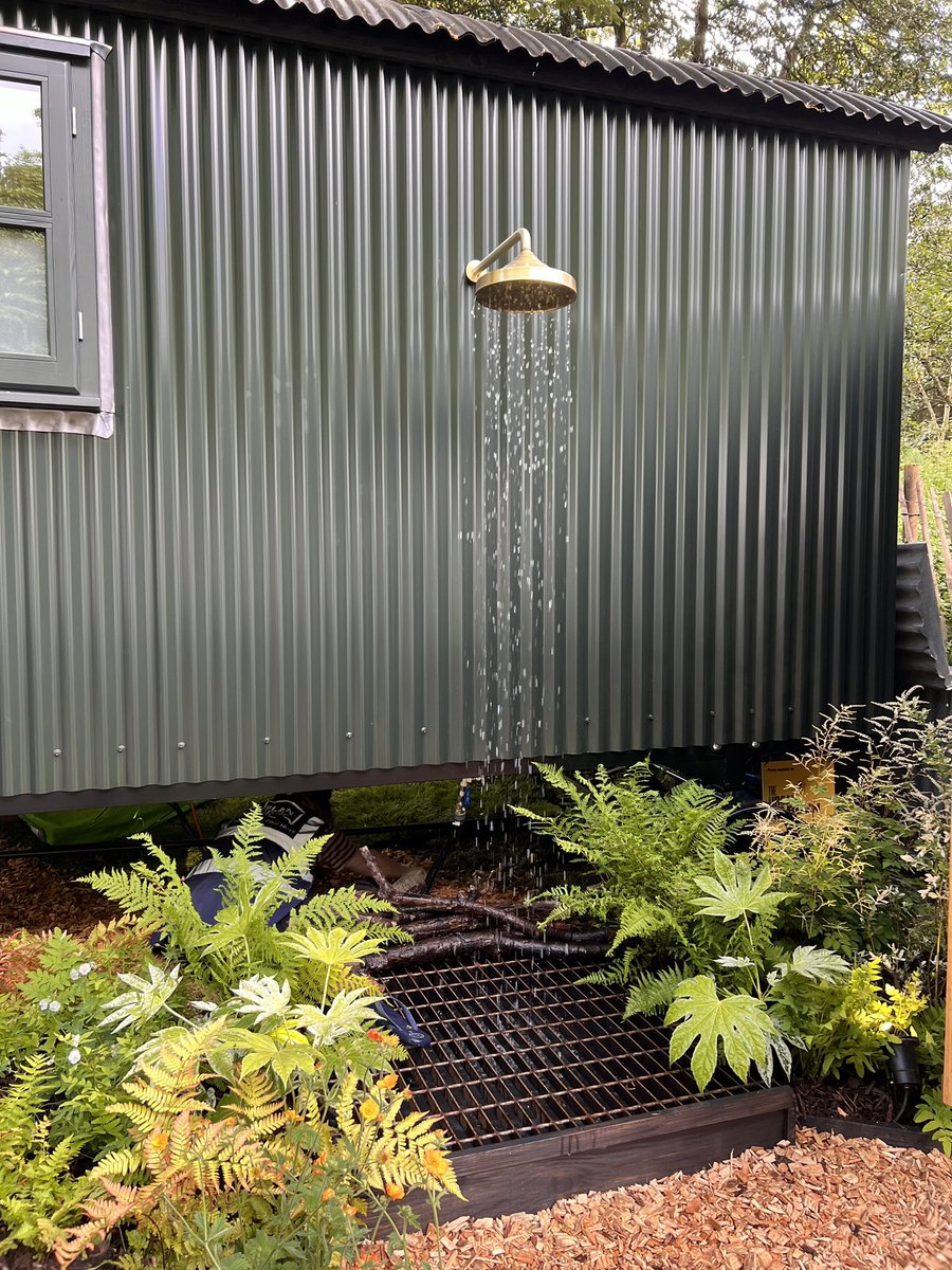 Into the final tweaks here at @The_RHS #ChelseaFlowerShow - the outdoor shower to compliment the sauna works a treat. The sauna was heated up earlier and some Finnish oil-infused water was applied to the stones. Lovely job.