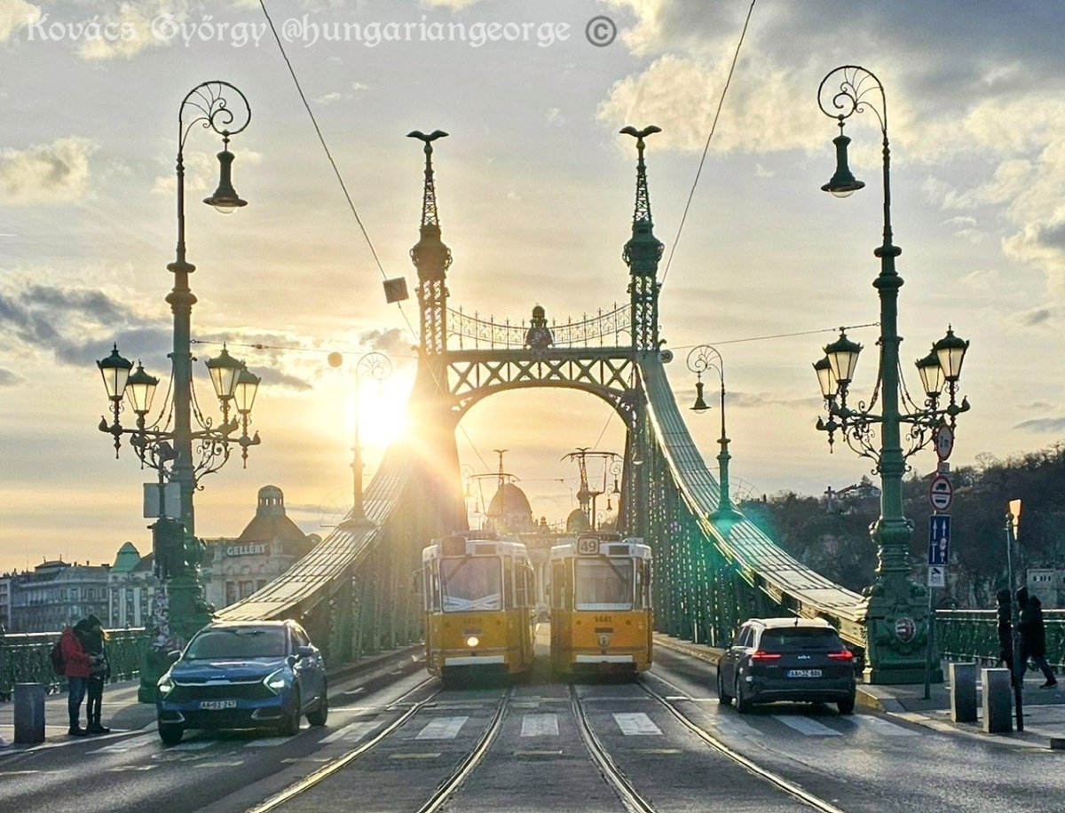 An older picture with a sunset from Liberty Bridge, Budapest #Budapest #Hungary #Europe #SunsetSerenity #PhotoMode #Travel #TravelTheWorld #文化旅游 #旅行 #Viajar #旅行