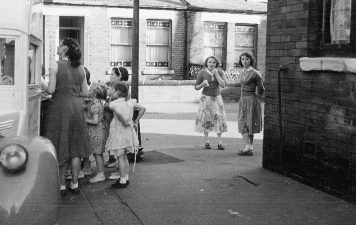 Queuing at an ice-cream van, Manchester. 1954.