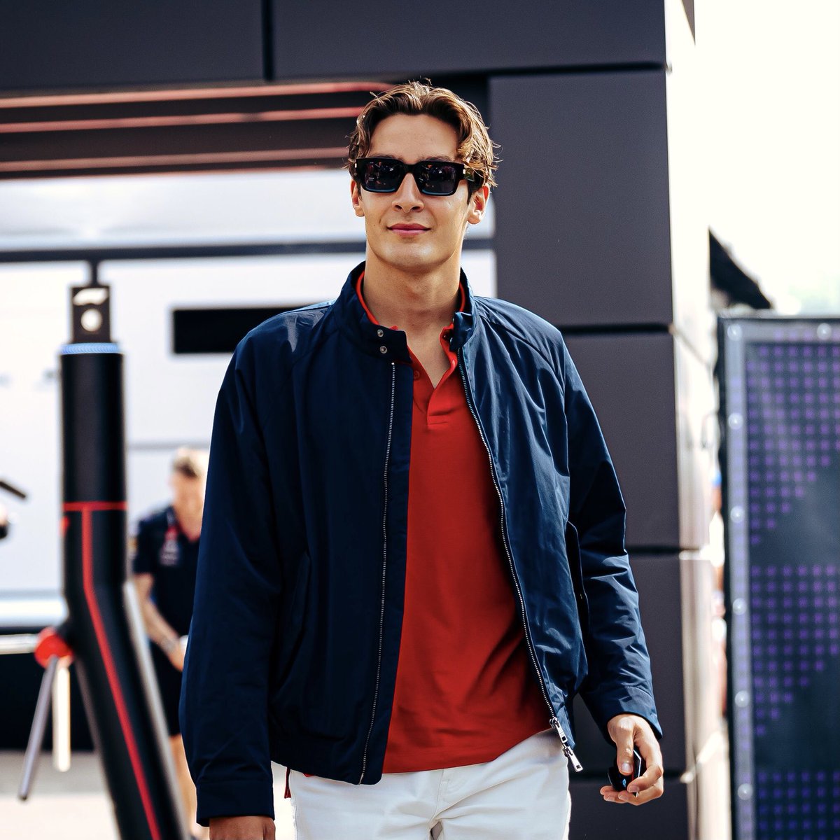 TommyHilfiger's tweet photo. .@GeorgeRussell63 wearing our iconic red, white, and blue at the #EmiliaRomagnaGP https://t.co/BbYwZXDZCh
