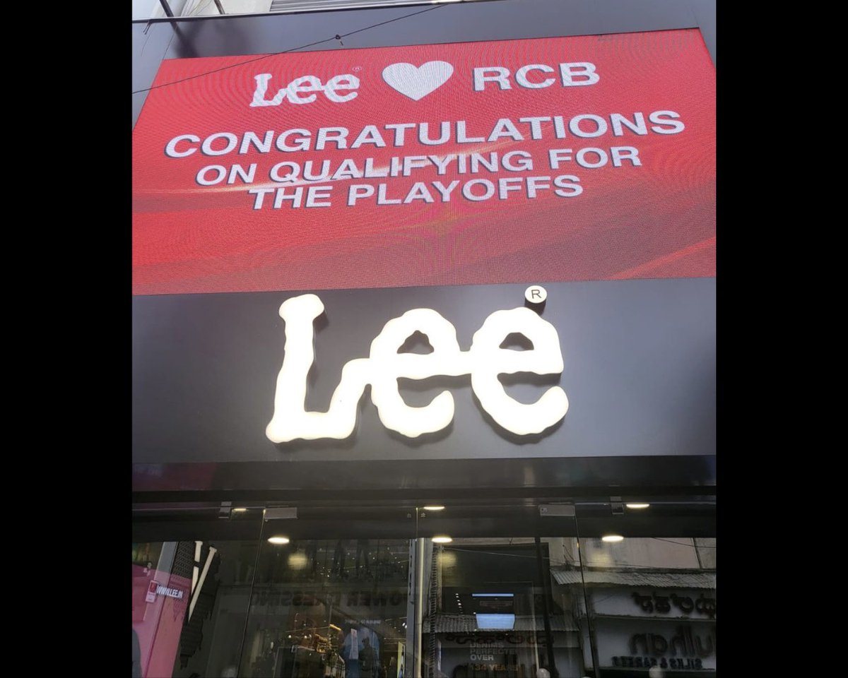 🏏✨ Congratulations to @RCBTweets for qualifying to the IPL 2024 playoffs! To celebrate this occasion, our brands @Lee_India and @Wranglerdenims have put up special messages at our retail stores in Bengaluru. Swing by, check them out, and share your support for RCB! #PlayBold