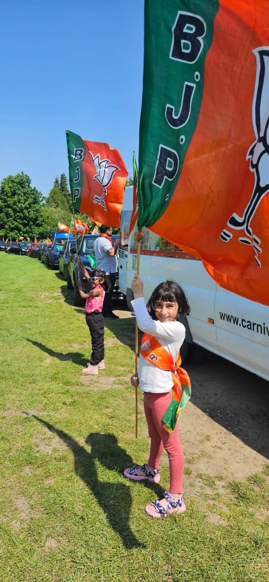 Pic of the day. Cute 🥰 Little children flagging off England Car Rally. #AbkiBaar400Paar #PhirEkBaarModiSarkar #NRI4NAMO @PMOIndia @HMOIndia @narendramodi @AmitShah @JPNadda @vijai63 @shekhawatkuldip @Sureshkm27 @myogiadityanath @annamalai_k