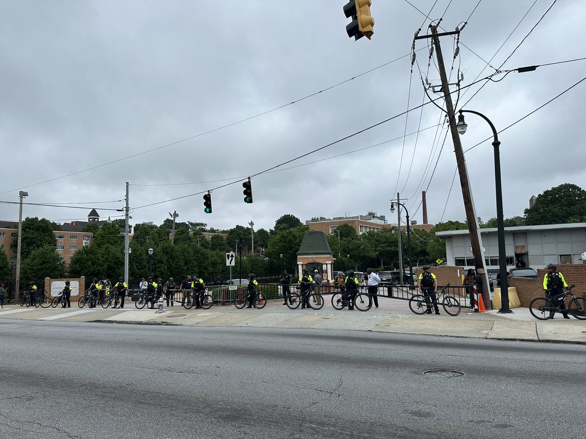 NOW: Protesters approaching #Morehouse where Biden is speaking for commencement despite student and alumni outcry. Cops on bikes have been trailing for a while. #Atlanta