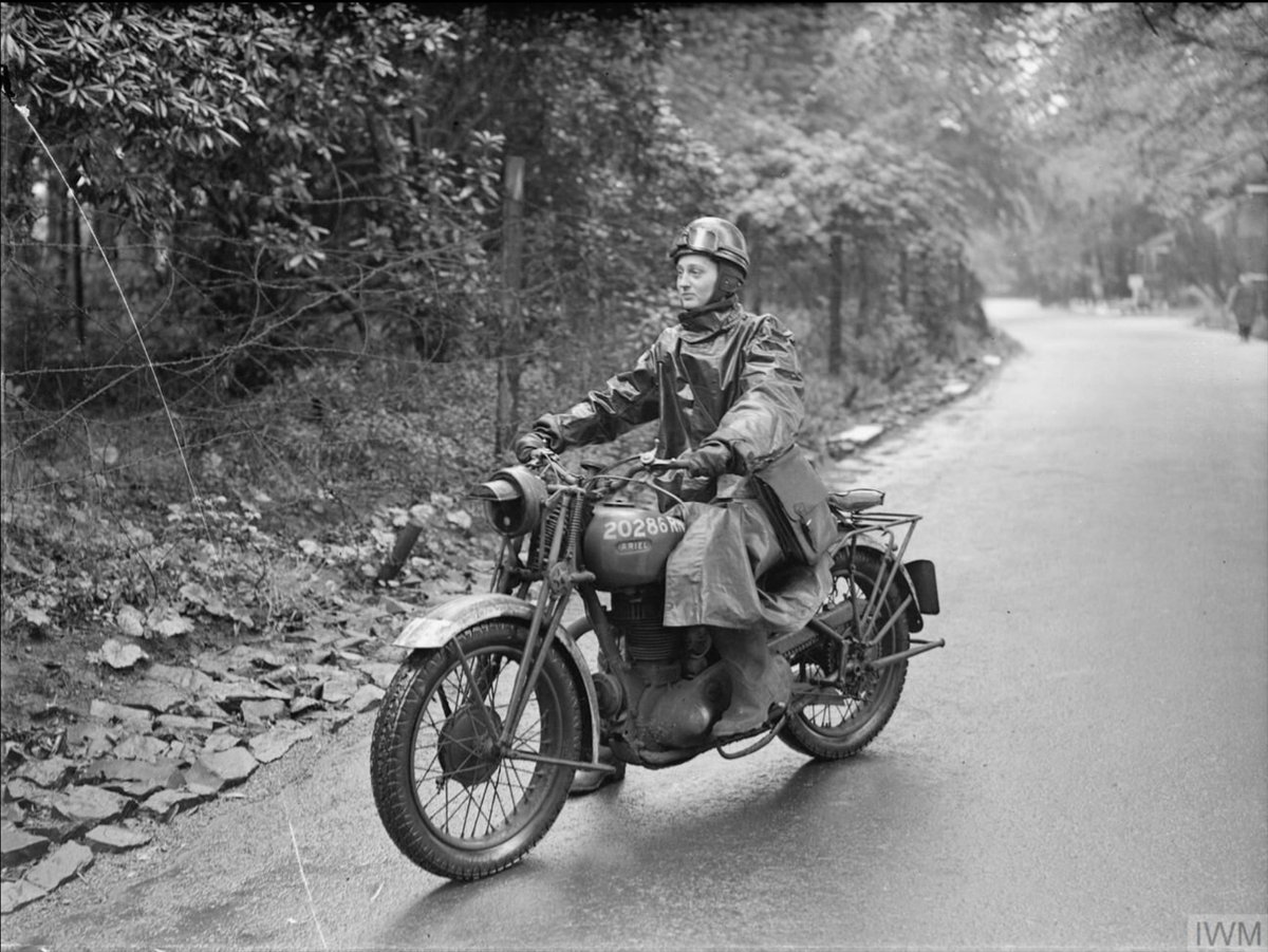 Today in 1944, Women's Royal Naval Service dispatch rider Joan Pallister, with her Ariel motorcycle, stands by to rush urgent messages from a naval operations centre in Rosyth to ships in the harbour. Photo: @I_W_M A 23516
