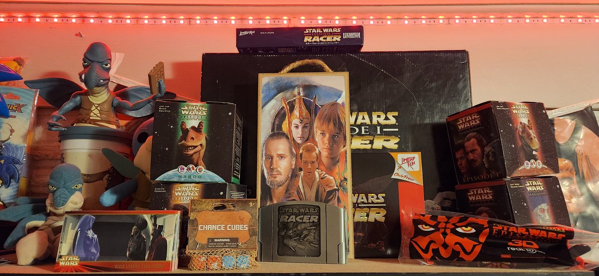 Happy 25th anniversary to The Phantom Menace. Over a decade ago, my friends began gifting me merch from the film that overran our local flea markets against my will. I now have a small, cursed shrine as the tradition continues. Here's to 25 more years of Watto in my home.