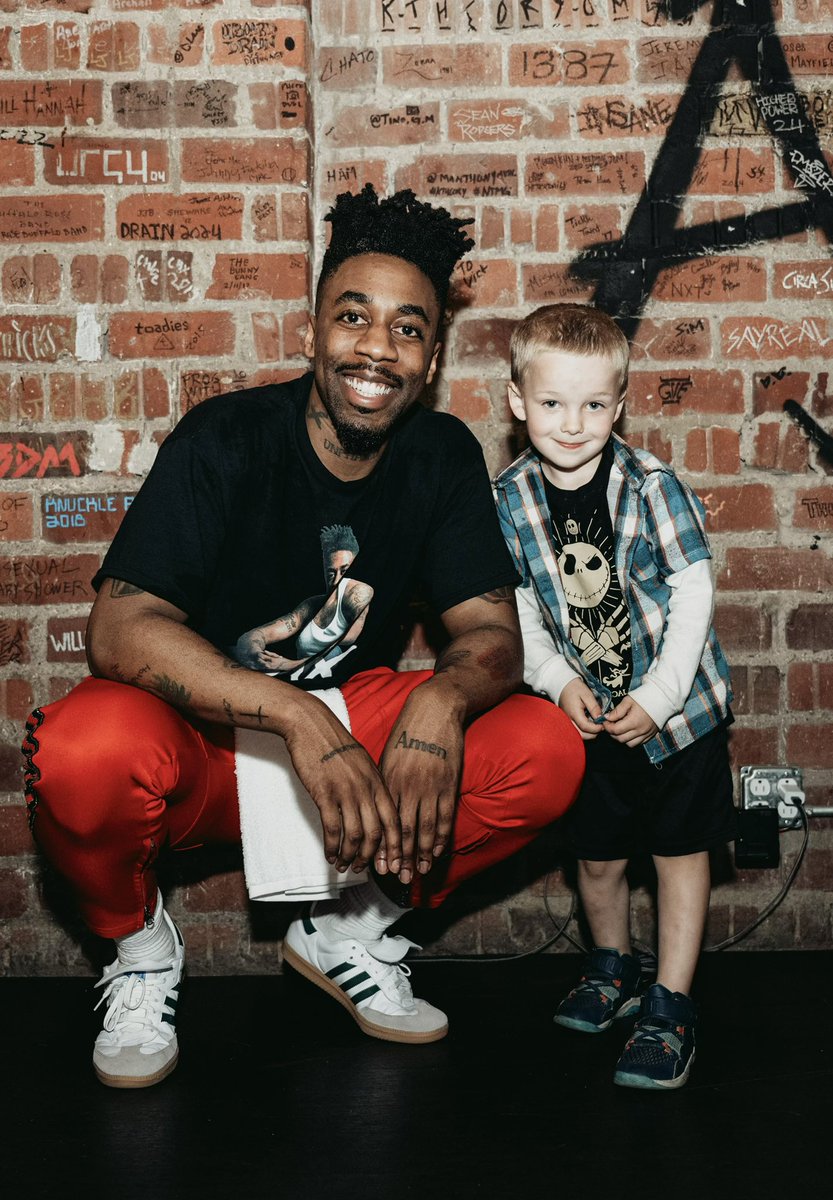 This little man’s name is LEGEND. He’s 5 years old. His grandmother and uncle were taking turns holding him up on their shoulders the WHOLE show last night so he could see and I was shocked to see him rapping and singing along with me word for word. I stopped the whole show and