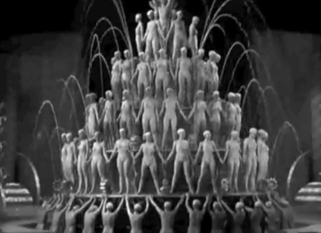 Hearing 'Shanghai Lil' isn't the only FOOTLIGHT PARADE (1933) in FEMALE (1933) ... You can see the waterfall 🎶is calling yoo-hoo-hoo-hoo🎶 ... The same pool from the 'By a Waterfall' musical sequence in FOOTLIGHT PARADE is used in FEMALE.