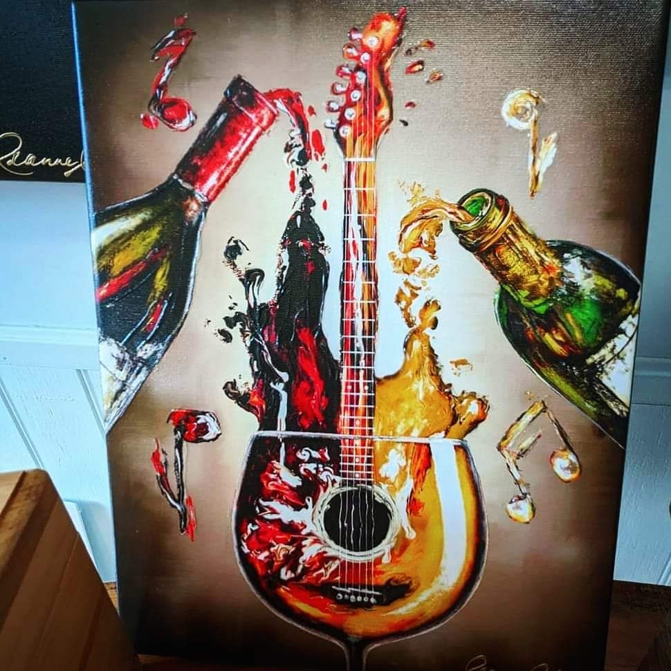 My #wineart 'Rockin Rosé' strumming away at The Art Alley in Kentucky (find this #wine #art in many sizes leannelainefineart.com) #wineartist #winetasting
