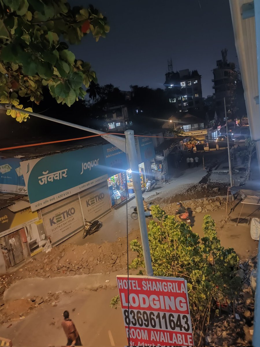 mashrujeet's tweet photo. Nearly 3 months now, the Brihanmumbai Municipal Corporation has not yet completed this less than 50 meters of road concretisation work outside the south entrance of Vile Parle station east. 

The footpath is not accesible. The road is shut. The street lights are not working. People have to walk in the dark, in dug up road, amidst construction materials to enter the railway station.

Why is it taking months for @mybmc contractors to finish up concretisation works for hardly 50  meters of road?
The third image is from March first week. 

This is not the only road. There are many such across the city. 

@mybmc