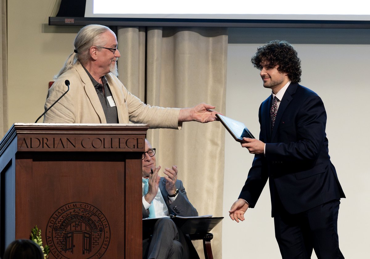 Me presenting two of my star seniors, Karson Bagelmann and Steven Martin, with the two Political Science departmental awards. Well deserved, I will miss having both of them in my classes. @AdrianCollege @IUMaurerLaw @kulawschool