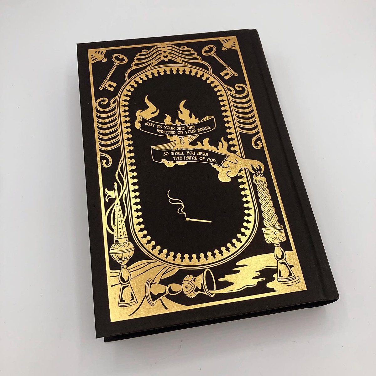 excited to finally share my gold foil hardcover designs for the @owlcrate edition of @LauraRSamotin's dark Jewish fantasy novel, The Sins on Their Bones! so thrilled with how this printed.