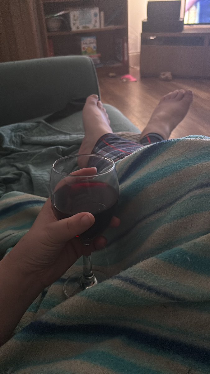Feet up, blanket & glass of red. How to chill after a long day at work. One more shift then 5 days off!!!! #nurseproblems