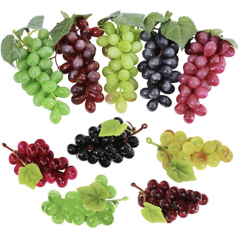 Delicious in Dungeon is 100% for people who want to eat inedible things like these (plastic) grapes: