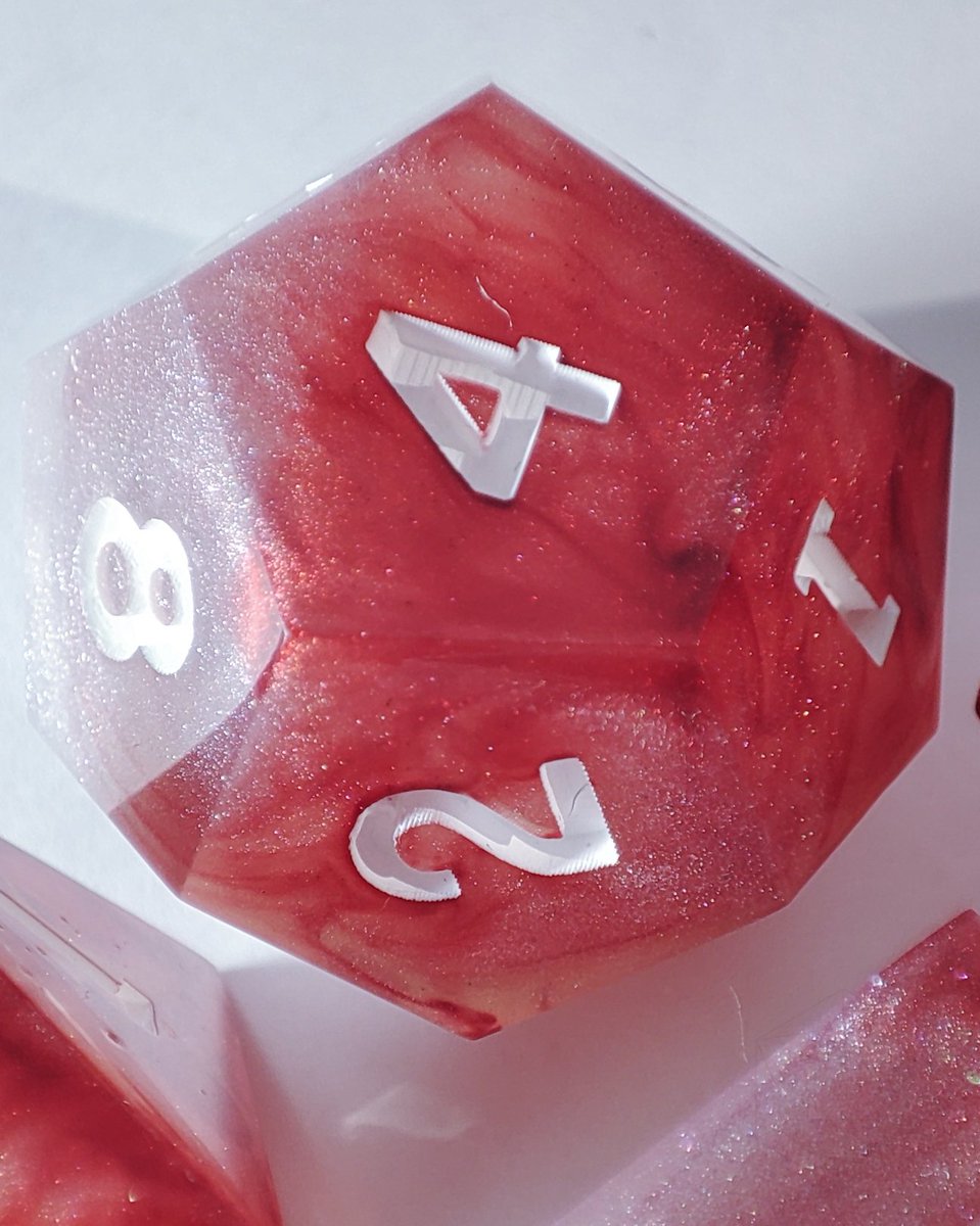 More macros of this set ❄️🩸
.
.
.
#diceset #dnddiceset #diceartist #diceart #handmadedice #handmade #resindice #resindiceset  #resinart  #resincasting #ttrpg #dicegame #polyhedraldice #artisandice #diceset