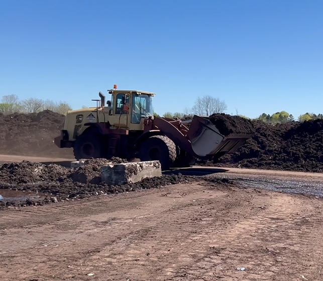 CompostCanada's tweet photo. Bucket loader and precious cargo on its way to the International Compost Awareness Week Party at Miller Compost Bloomington in York Region, Ontario! Party on Composters! Doing great work to fight climate change and create healthy soils. 
#icaw2024
#millercomposting
#compostweek https://t.co/kJSZ7nD6aT