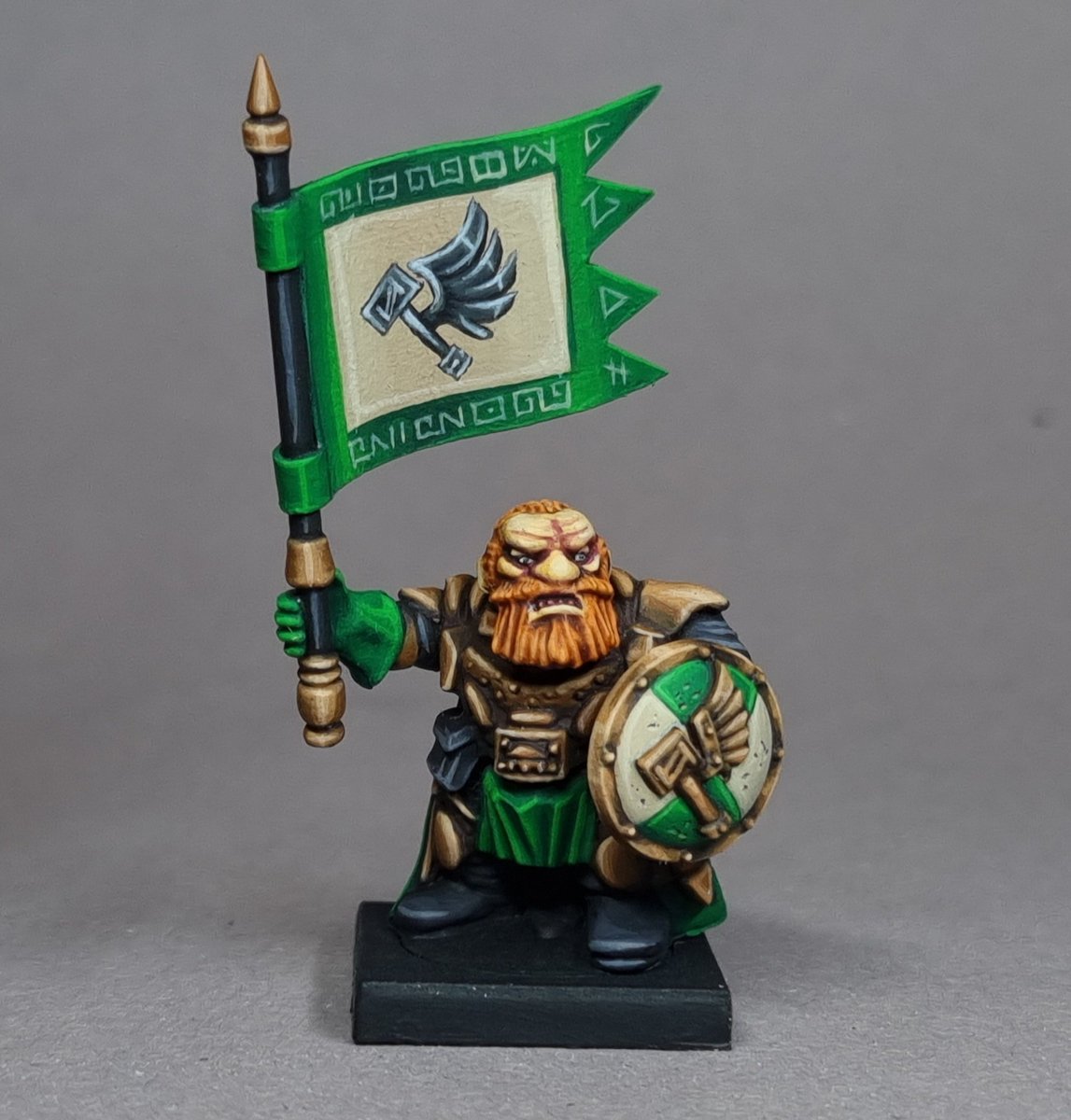Ranulph Thunderbrow carries the clan banner as a great honour. He also carries an ancient relic shield into battle. An artifact from times long past, some say best forgotten. 

#warmongers
#mymantic