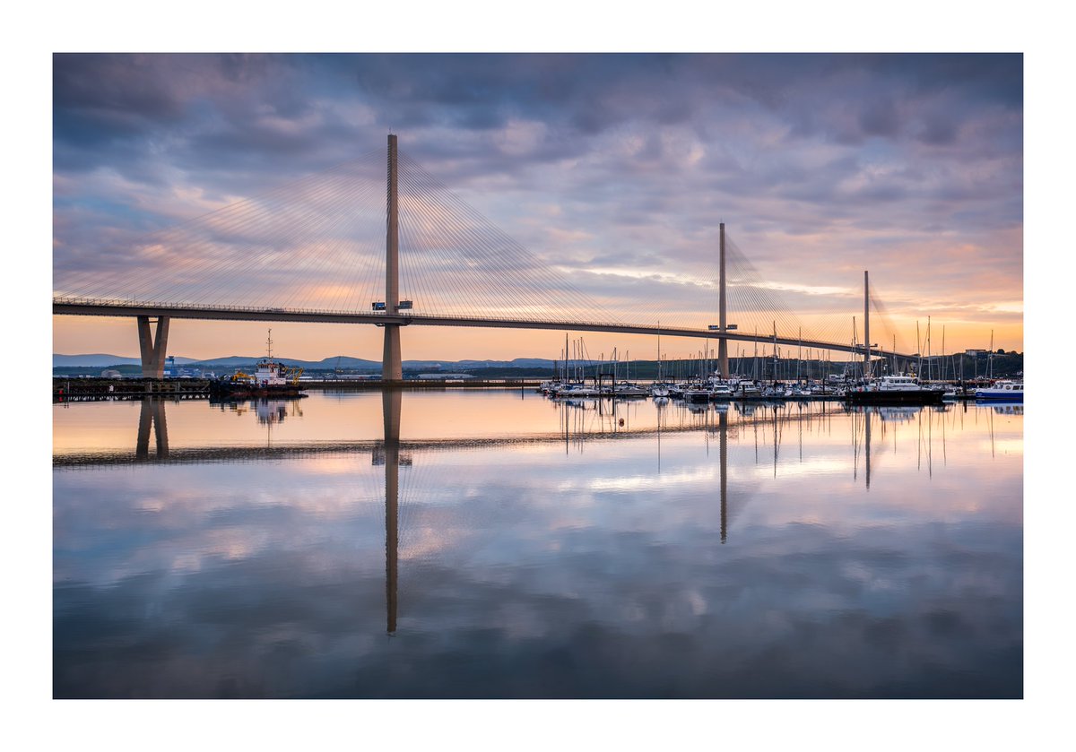 PORT EDGAR MARINA: After watching the sun rise under the Forth Bridge I turned my attention towards the Queensferry Crossing and calm reflections in the marina. #appicoftheweek @3LeggedThing @NewForthBridge @FujifilmUK @fujilovemag