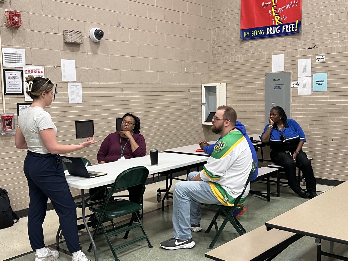 Our BCBA with our security and lunchroom supervisors! Leading them through reactivity training the rest of the staff received at a previous late start! We want all staff to get the same training!! #BeEvergreen