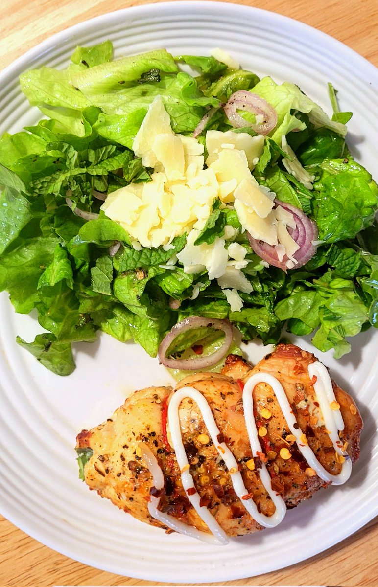 Spinach and brie stuffed chicken breast and simple lettuce and parmesan salad.