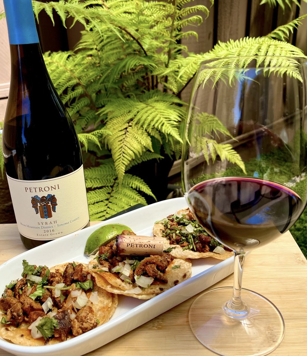 #TacoTuesday time with a syrah by @PetroniWine in Sonoma. This one shows a nose of black cherry, tobacco and licorice with tastes of blackberry, violets and anise. Pretty tasty. I think this winery has closed, not sure. @boozychef @jflorez @AskRobY @sonoma @amy_oosterhouse