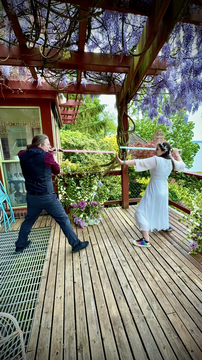 I missed my May 4th tweet but I was a little preoccupied by marrying my best friend, the love of my life, the best person I know. <a href="/kayla_wolfe/">Miki Wolfe, LVT</a> yes our officiant was dressed as Ahsoka and yes we had lightsabers 😎