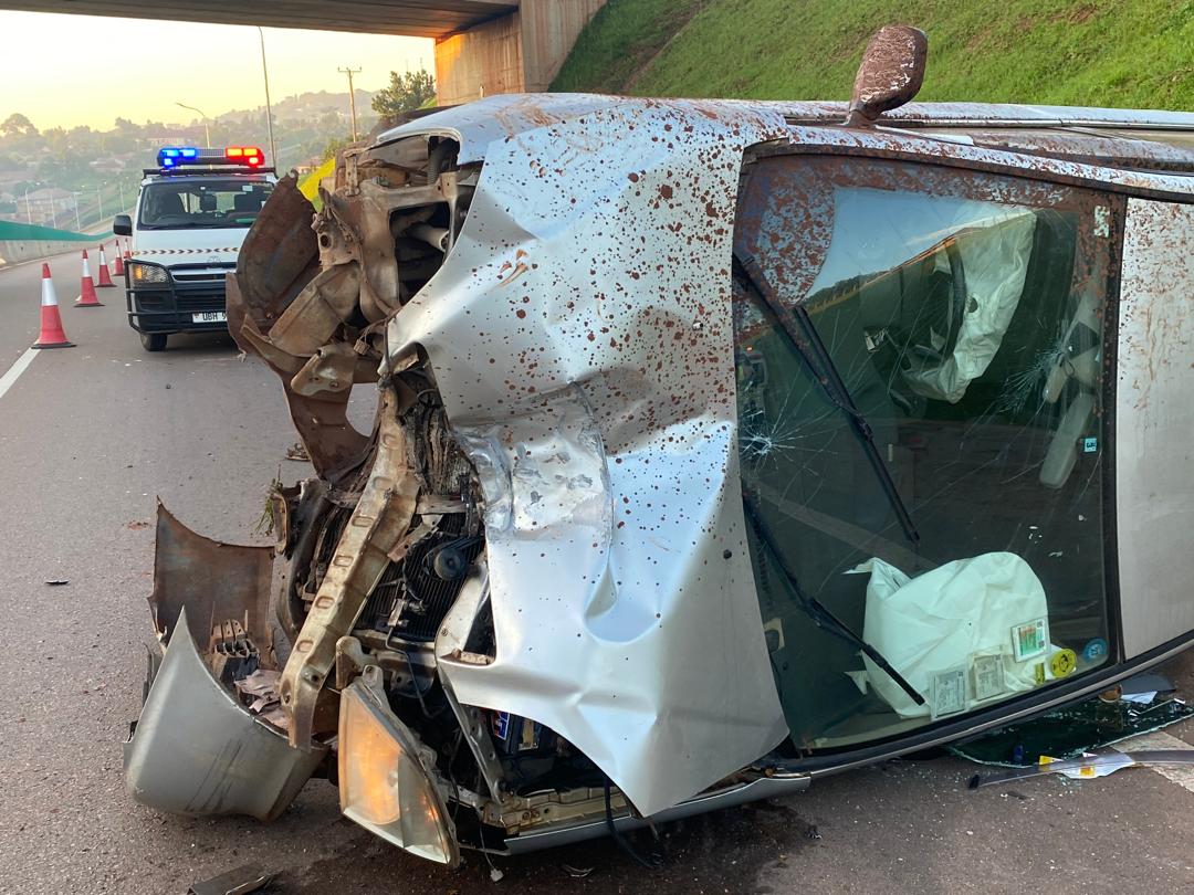 Early morning accident along Kampla - Entebbe express way, according to witness accounts, the speeding driver lost control; knocking a street light pole hence over turning the car. the two occupants are still alive.