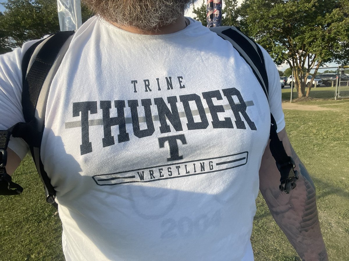 Day 7 of #WrestlingShirtADayinMay (also the first #HandsomeTuesday of May) featuring @TrineWrestling. Smash that heart if you want them to win a donation.