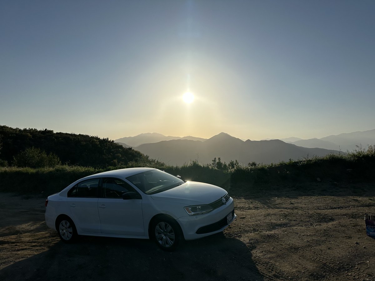 i swear this will be my last take on cars for today but i bought a car and drove up a mountain went from one of the major cities on the planet to this view within half an hour 10/10 can recommend (german car because why not)