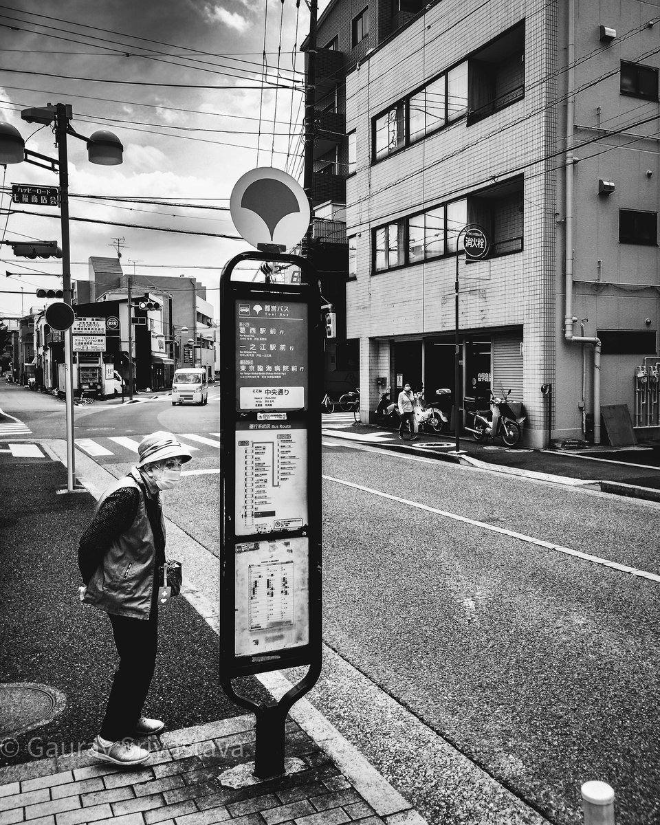 A lady waits for her bus on a bright sunny pleasant afternoon. #streetphotography #blackandwhite #tokyo #Japan #MetGala #Eurovision #AppleEvent #LovelyRunnerEp10