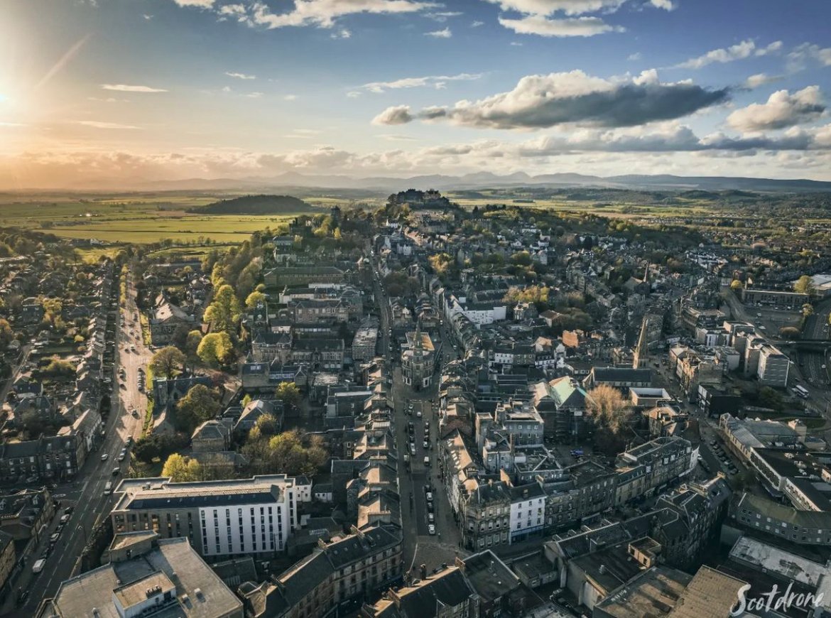 WOW!! Stirling city centre in the late evening sun captured by @scotdrone #IGStirUni #BeHereBeStirling