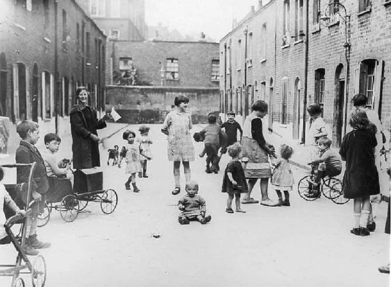 A view of a road where kids were safe to play outside in Hoxton, London, taken in 1920.