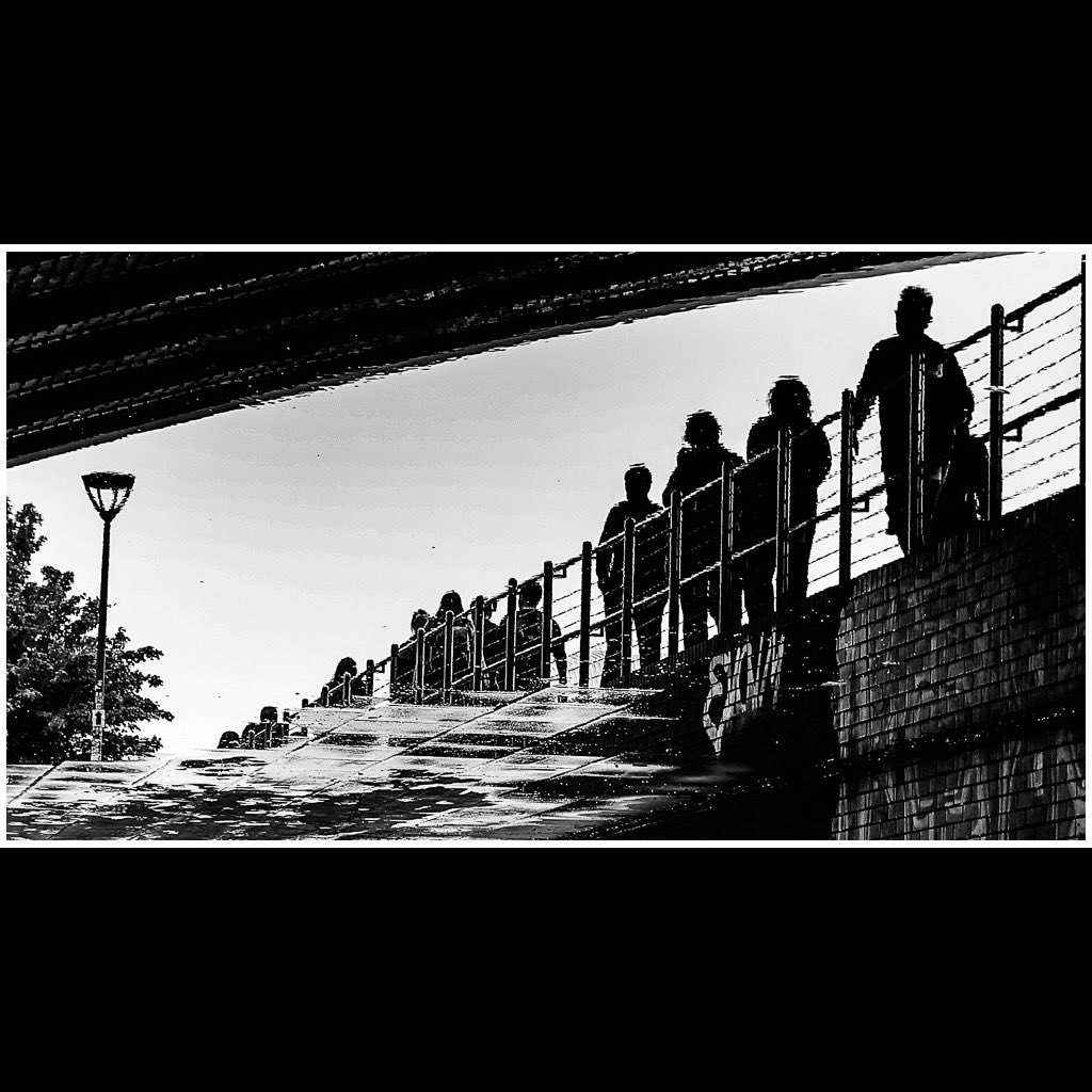 Leaving . Inverted and reversed reflection on the South Bank . #london #rfshooters #eosr10 #mono #blackandwhite #southbank #canoneosr10 #streetsnapperscollective #reflection