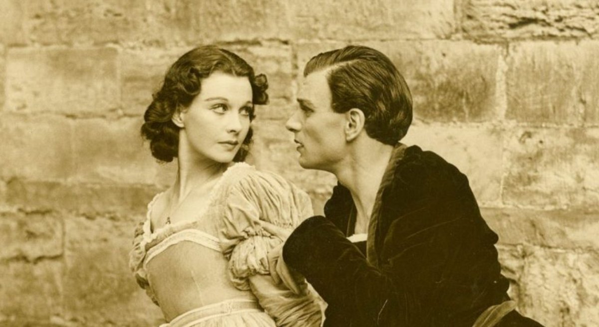 Vivien Leigh and Laurence Olivier in Hamlet against the high walls of Kronborg Castle in Elsinore. A reviewer said, 'Miss Vivien Leigh playing Ophelia for the first time, turned everything to favour and prettiness.' #TCM #oldHollywood #GWTW #GONEWITHTHEWIND #TCMparty #VivienLeigh