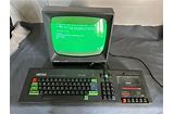Good Morning.  

Comment with images of both the first console and computer you ever had.

Mines was,

1.  Atari 2600.
2. Amstrad CPC 464 Green Screen.