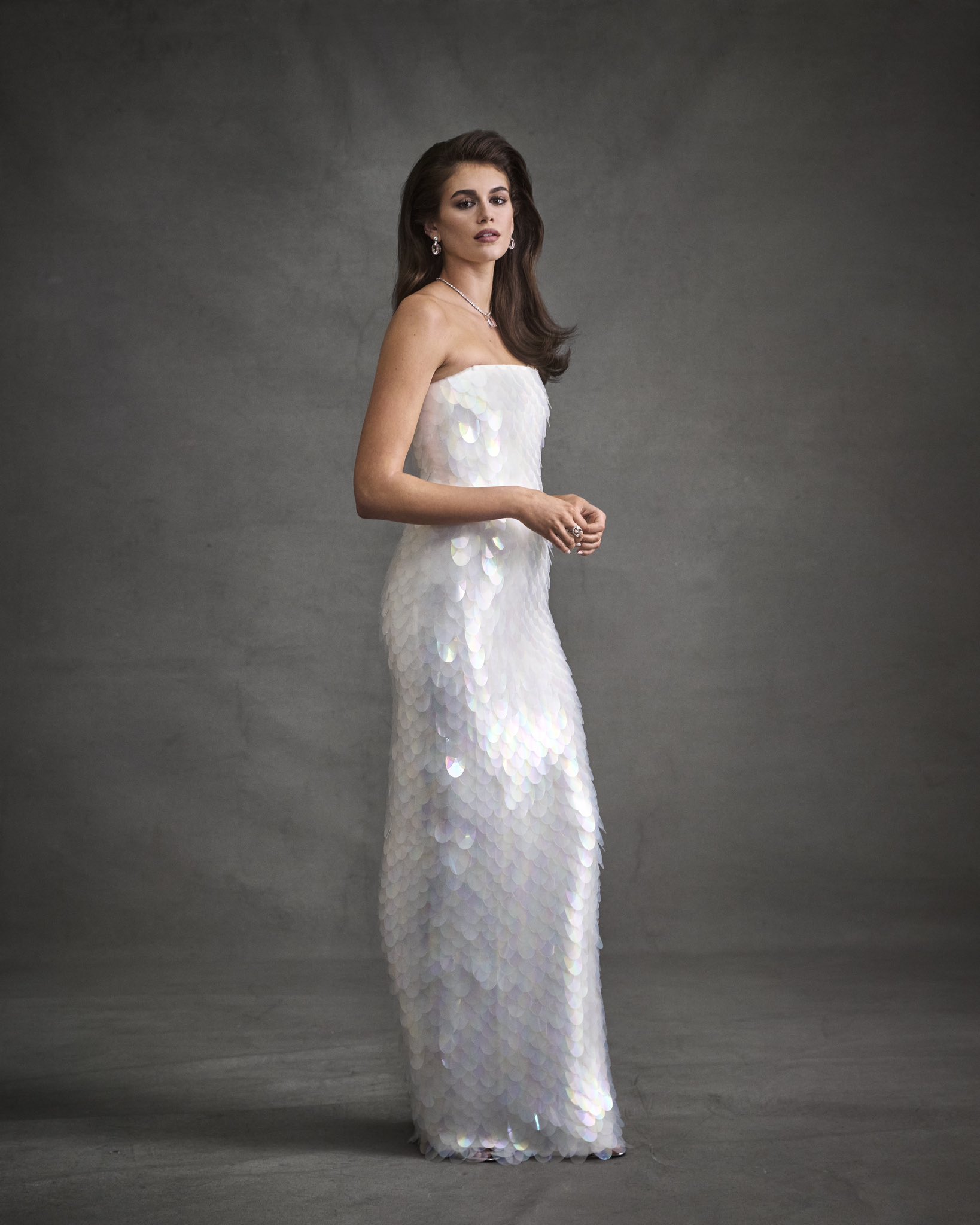 PRADA on X A paillette embroidered dress worn by Kaia Gerber re envisions past Prada codes evoking the natural wonder of iridescent scales for the 2024 Met Gala theme The Garden of Time. PradaPeople