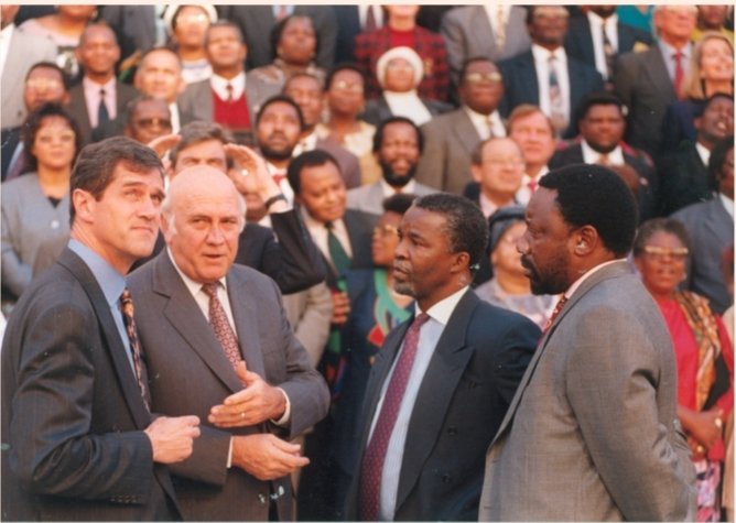 🆃🅷🅸🆂 🅳🅰🆈 🅸🅽 🅷🅸🆂🆃🅾🆁🆈 (08 May 1996) Roelf Meyer, Deputy President F. W. de Klerk, Deputy President Thabo Mbeki and the Chairperson of the Constitutional Assembly Cyril Ramaphosa in a discussion following the adoption of the Constitution…