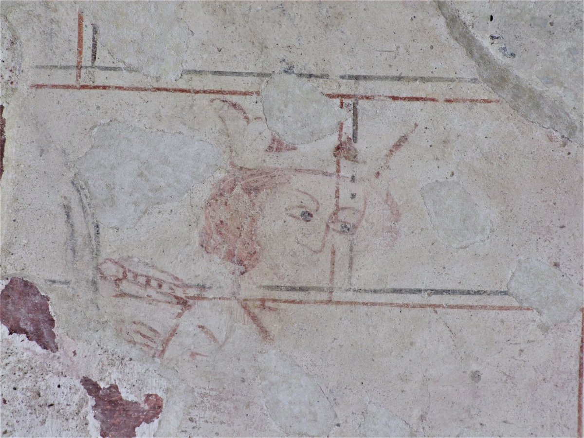 The head of St Edmund peeps through at Mundon, Essex in the care of @friendschurches #wallpaintingWednesday