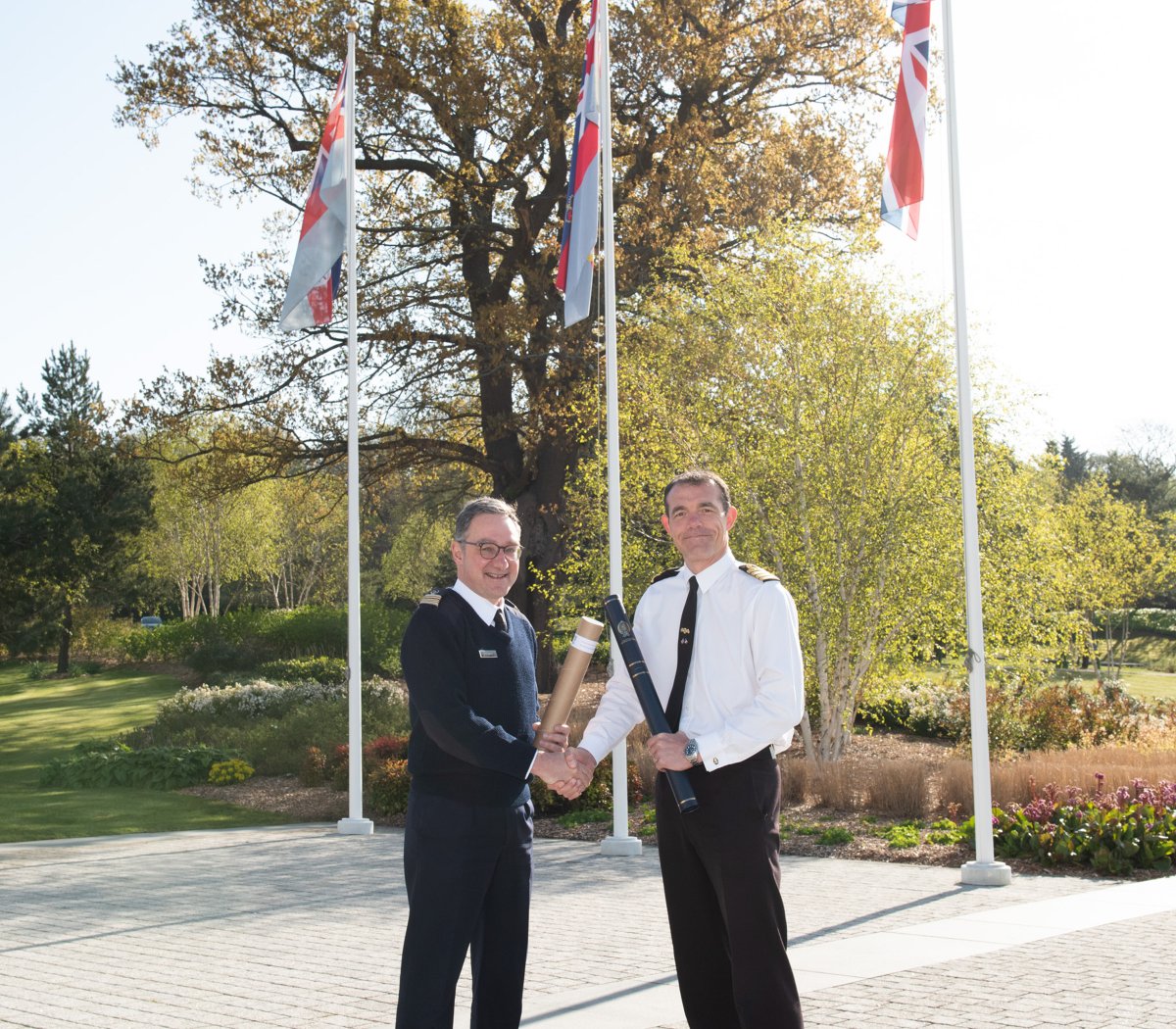 Captain Patrick Mowatt (UK National Centre for Geospatial Intelligence) and Captain <a href="/PierreYvesDupuy/">Pierre-Yves Dupuy</a> (<a href="/shom_fr/">Shom</a>) exchange historical charts to commemorate the 120th anniversary of the Entente Cordiale and the contribution of hydrography to the UK and French defence relationship.
