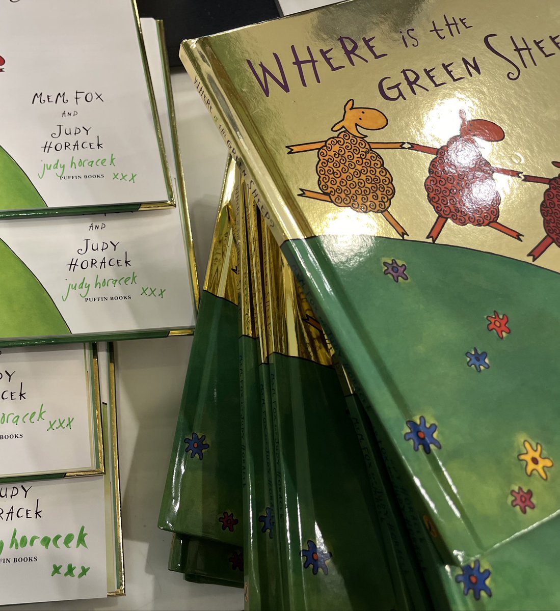 Jyst sogned a whole stack of the golden 20th Anniversary edition of ‘Where is the Green sheep?’  20 years old! But where are the signed books? At @ReadingsBooks - their kids’ shop in Carlton! 💚💚💚