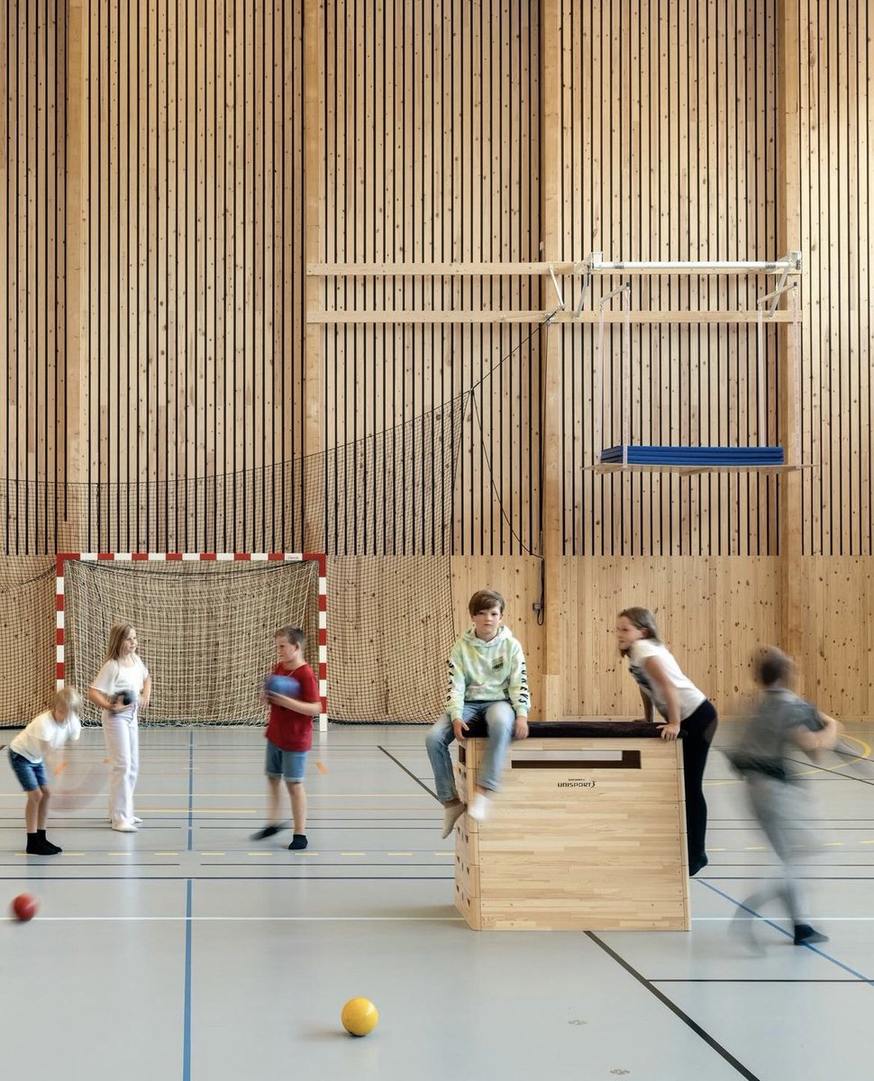 Love this bright green timber sports hall and school by White Arkitekter in Eksjo, Sweden

Glulam columns and beams and CLT floors.