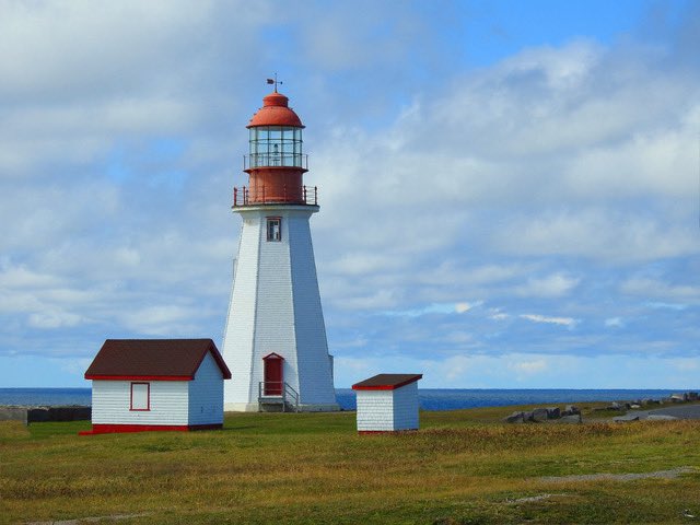 The lighthouse at Point Riche. We were there Monday on our way up north to photograph the caribou who hang around this area. They have been here for years.