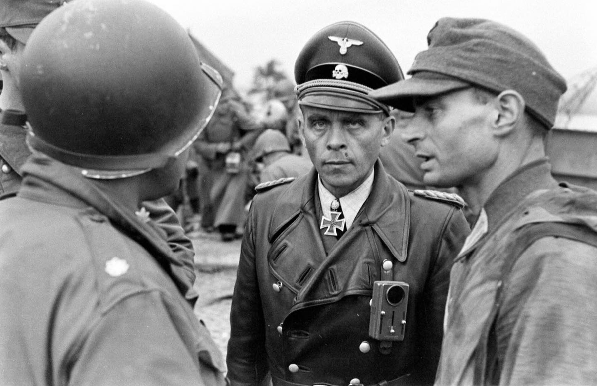 Brigadeführer Jürgen Wagner, Commander of the 23rd SS Volunteer Panzer Grenadier Division Nederland, surrenders to LtCol Leroy E Frazier of the US Army 405th IR, 102d ID at the River Elbe near Tangermünde Germany - May 6, 1945
LIFE Magazine - William Vandivert Photographer