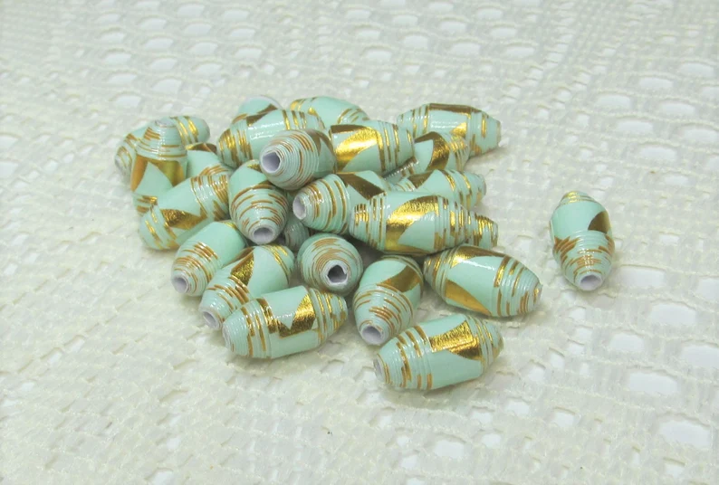 Paper Beads, Loose Handmade Jewelry Making Supplies Craft Supplies Bullet Tube Gold Foil Damask on Mint Green etsy.me/4aaMvo7 via @Etsy #paperbeads #handmadebeads #jewelrymakingbeads #craftingbeads
