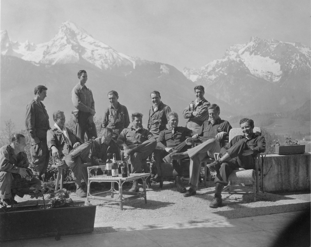 Major Richard Winters, Captain Lewis Nixon, and other men of Easy Company (portrayed in HBO's Band of Brothers) celebrate V-E day in Hitler's private residence at Berchtesgaden in the Bavarian Alps on May 8, 1945.

#WWII #History #ThisDayInHistory