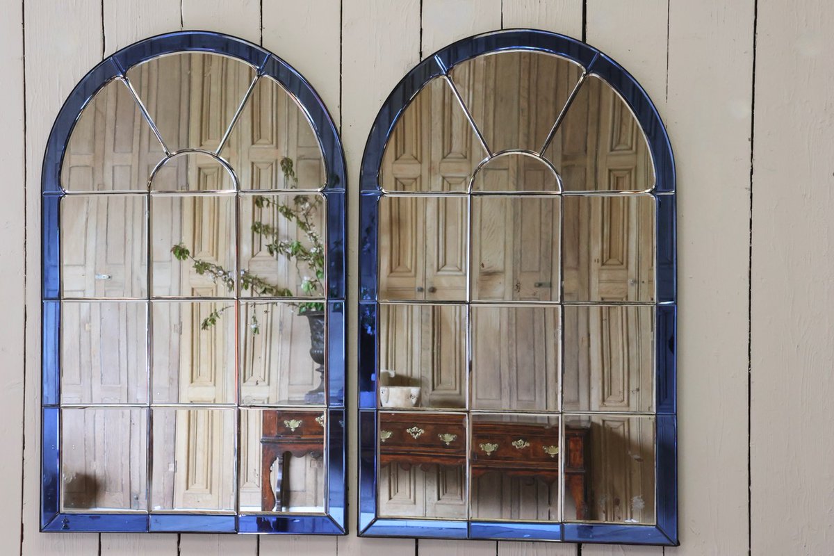 Fun Pair of Mid 20th Century Blue glass Framed Mirrors

rb.gy/ivk61s

#pairofmirrors #antiquemirror #glassframedmirrors #decorativeantiques #homedecor