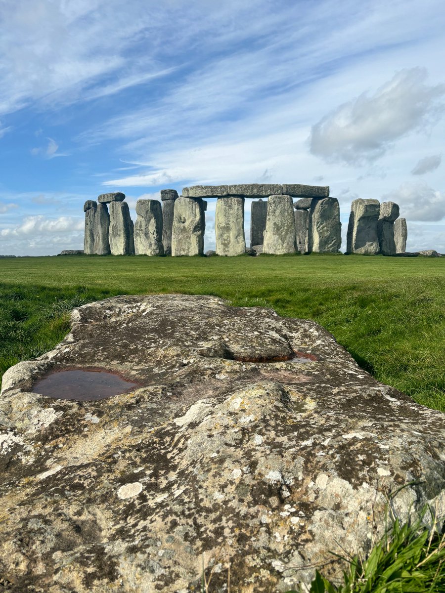 The Slaughter Stone gets its gruesome name from the red-coloured rainwater collecting on its surface and the over-active imagination of the Victorians. It originally stood upright at the entrance to Stonehenge and was flanked by additional stones that are now missing.