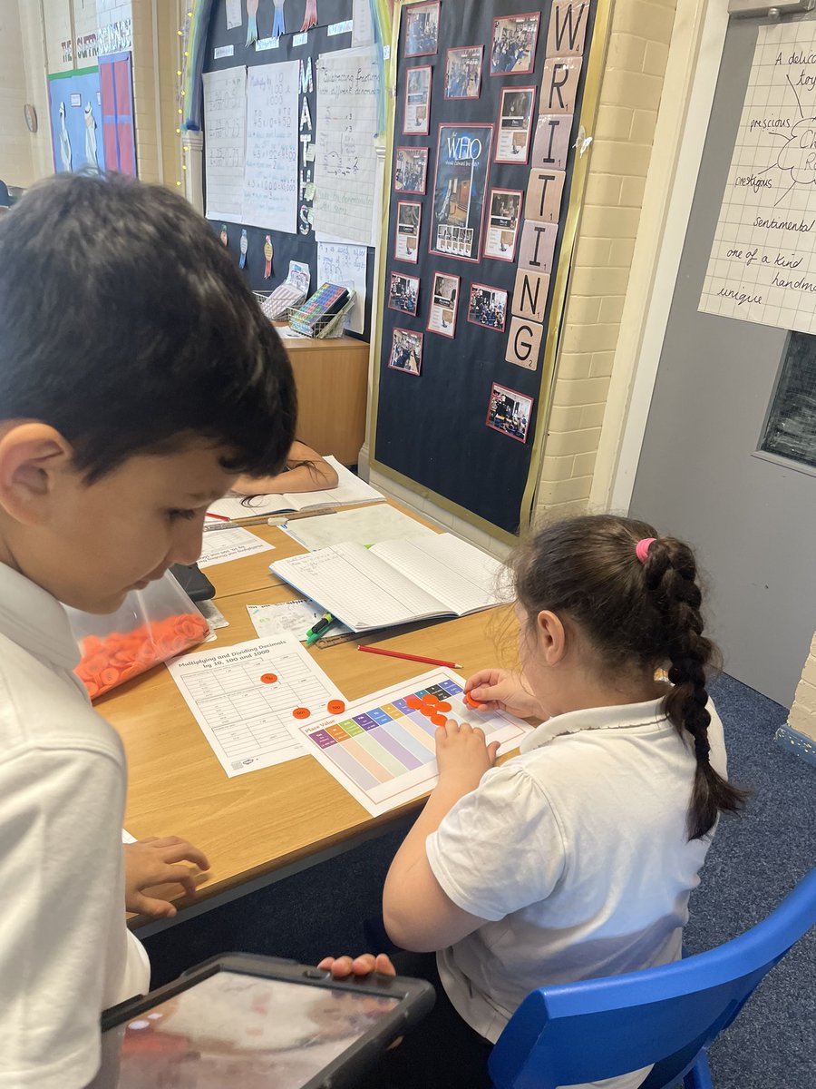 HMSDragon23's tweet photo. Multiplying by 10, 100 and 1000
Is catching us out on our weekly arithmetic testing. So today we are practically moving to the left! 
Let’s improve our scores for our class arithmetic rainbow challenge 🌈 @deltamathspupil @DeltaStrand https://t.co/i44DuSXO3N